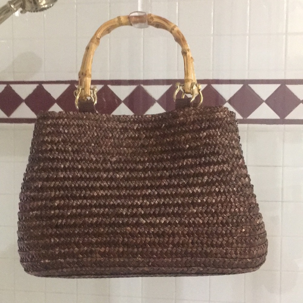 Brown straw handbag with bamboo handles